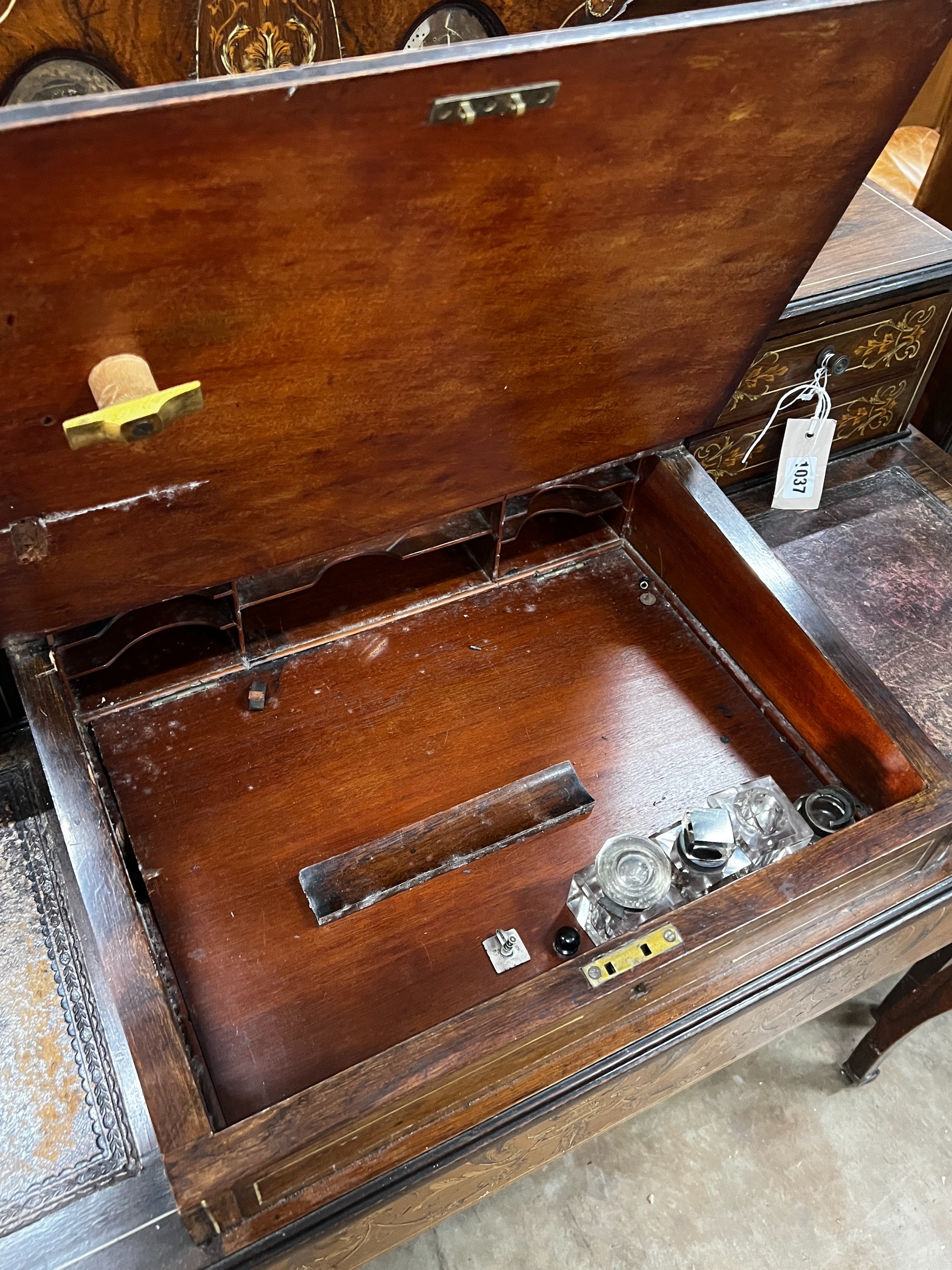 An Edwardian marquetry inlaid rosewood writing desk, width 98cm, depth 46cm, height 113cm